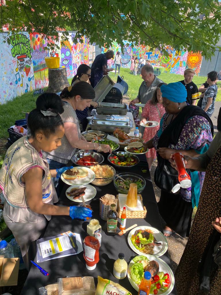 community preparing meal